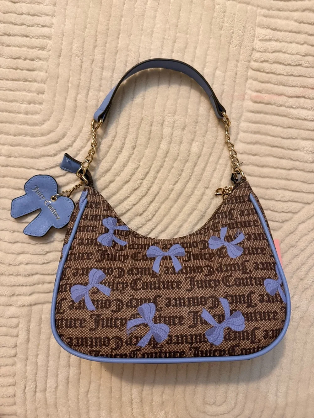 Juicy Couture Brown Monogram Shoulder Bag with Blue Bow Accents
